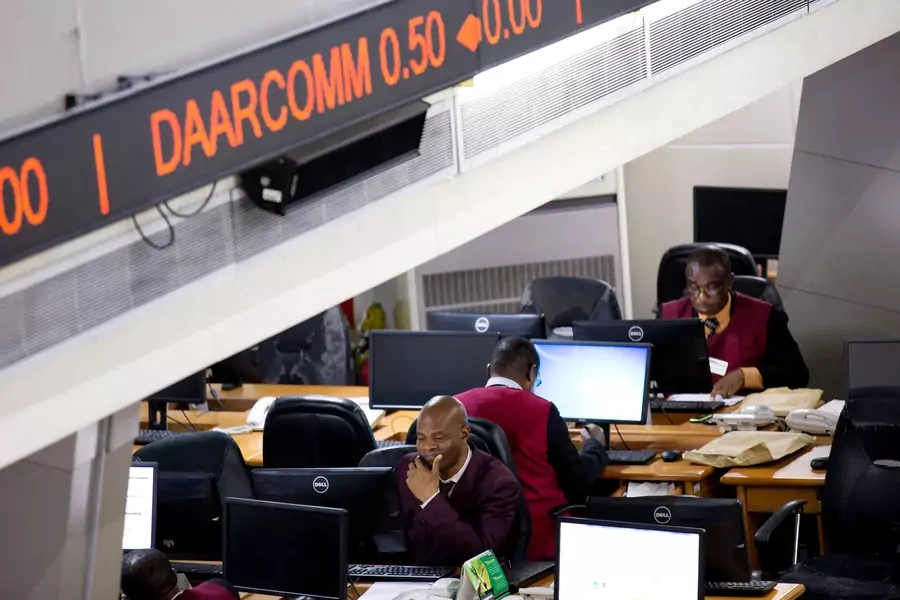 Traders work at the Nigerian Stock Exchange where venture capitalists have the opportunity to invest in startups and other entrepreneurial projects in Lagos, February 13, 2015. 