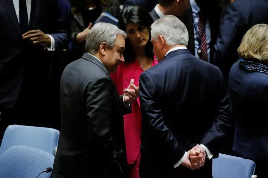 U.S. Secretary of State Rex Tillerson speaks with UN Secretary General Antonio Guterres and U.S. Ambassador to the United Nations Nikki Haley following a Security Council meeting at the United Nations in New York on April 28, 2017.