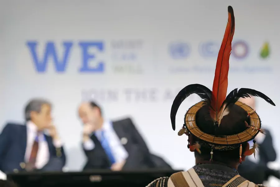 A representative of indigenous Peruvian people attends the World Climate Change Conference 2015 in Le Bourget, France, on December 1, 2015.
