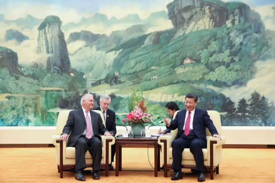 U.S. Secretary of State Rex Tillerson (L) meets with Chinese President Xi Jinping (R) at the Great Hall of the People in Beijing, China September 30, 2017.