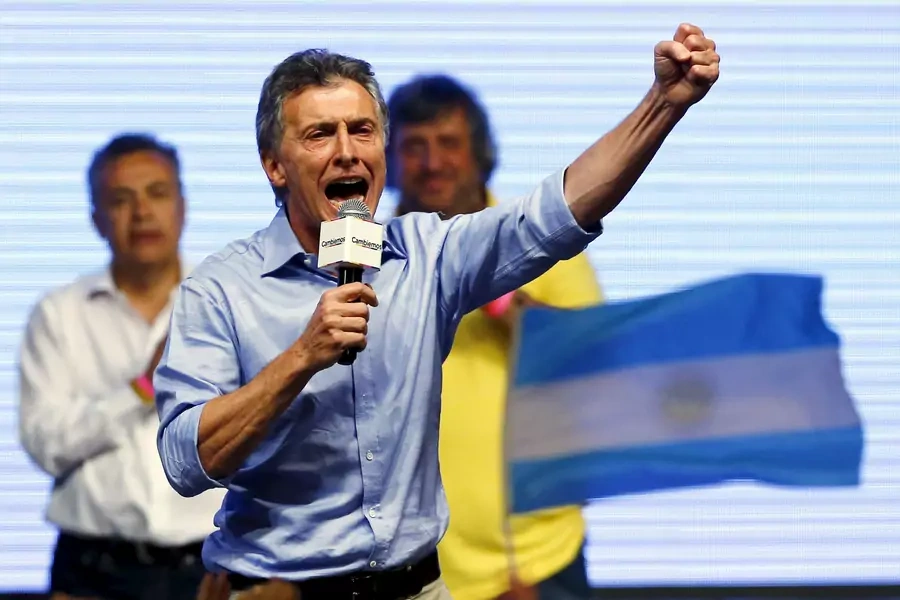 Mauricio Macri, presidential candidate of the Cambiemos (Let's Change) coalition, gestures to his supporters after the presidential election in Buenos Aires, Argentina, November 22, 2015. 