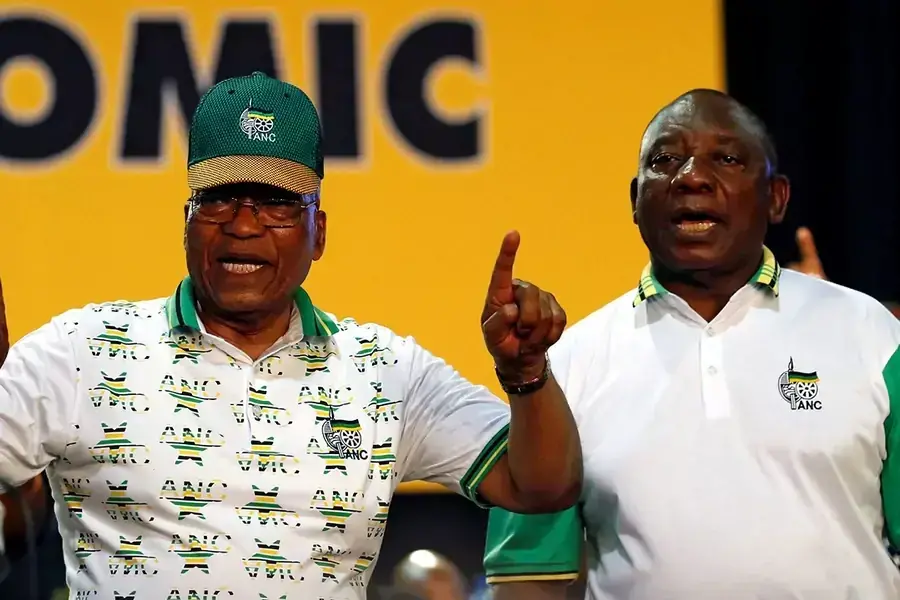 South Africa's President Jacob Zuma sings next to newly elected president of the ANC Cyril Ramaphosa during the 54th National Conference of the ruling African National Congress (ANC) in Johannesburg, South Africa December 18, 2017.