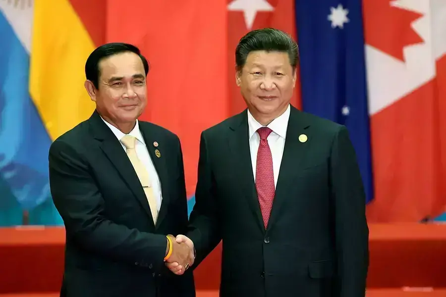 China's President Xi Jinping shakes hands with Thailand's Prime Minister Prayuth Chan-ocha during the G20 Summit in Hangzhou, Zhejiang province, China, on September 4, 2016.