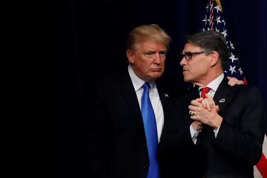 U.S. President Donald Trump talks with Energy Secretary Rick Perry after delivering remarks during an "Unleashing American Energy" event at the Department of Energy in Washington, U.S., June 29, 2017. 