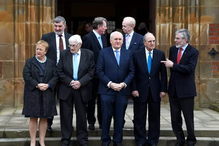 Good Friday Agreement negotiators stand for a group photograph at an event to celebrate the 20th anniversary of the Peace Talks. Belfast, April 10, 2018. 