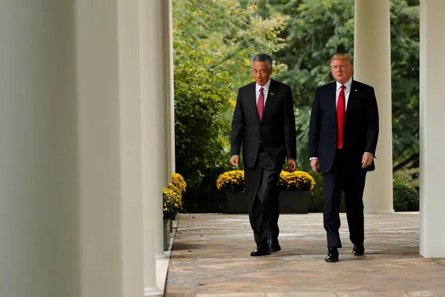 U.S. President Donald J. Trump and Singapore’s Prime Minister Lee Hsien Loong walk out to deliver joint statements to reporters at the White House in Washington, DC on October 23, 2017.