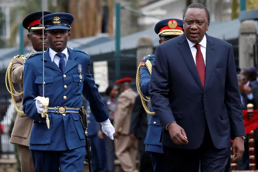 Kenya's President Uhuru Kenyatta arrives to inspect a guard of honor before the annual State of the Nation address at the Parliament Buildings in Nairobi, Kenya May 2, 2018.