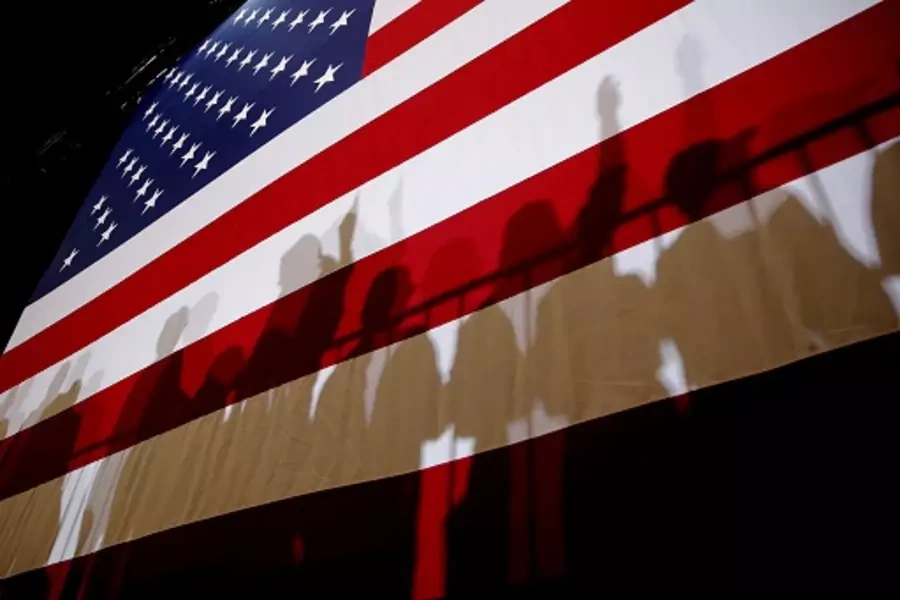 Shadows are seen on an American Flag. 