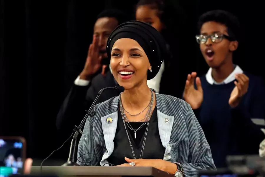 Democratic congressional candidate Ilhan Omar reacts after appearing at her midterm election night party in Minneapolis, Minnesota.