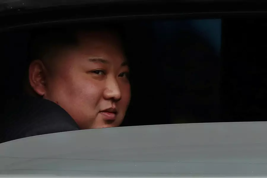 North Korea's leader Kim Jong-un sits in his vehicle after arriving at the Dong Dang railway station, Vietnam, at the border with China on February 26, 2019. 
