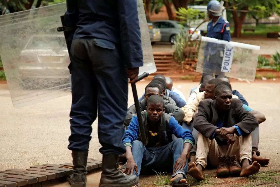 People arrested during protests wait to appear in the Magistrates court in Harare, Zimbabwe, January 16, 2019. 