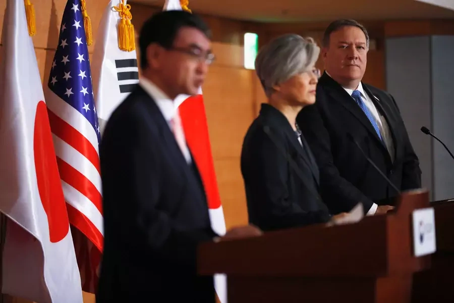 U.S. Secretary of State Mike Pompeo looks on next to South Korea's Foreign Minister Kang Kyung-wha and Japan's Foreign Minister Taro Kono during a joint news conference at the Foreign Ministry in Seoul, South Korea on June 14, 2018.