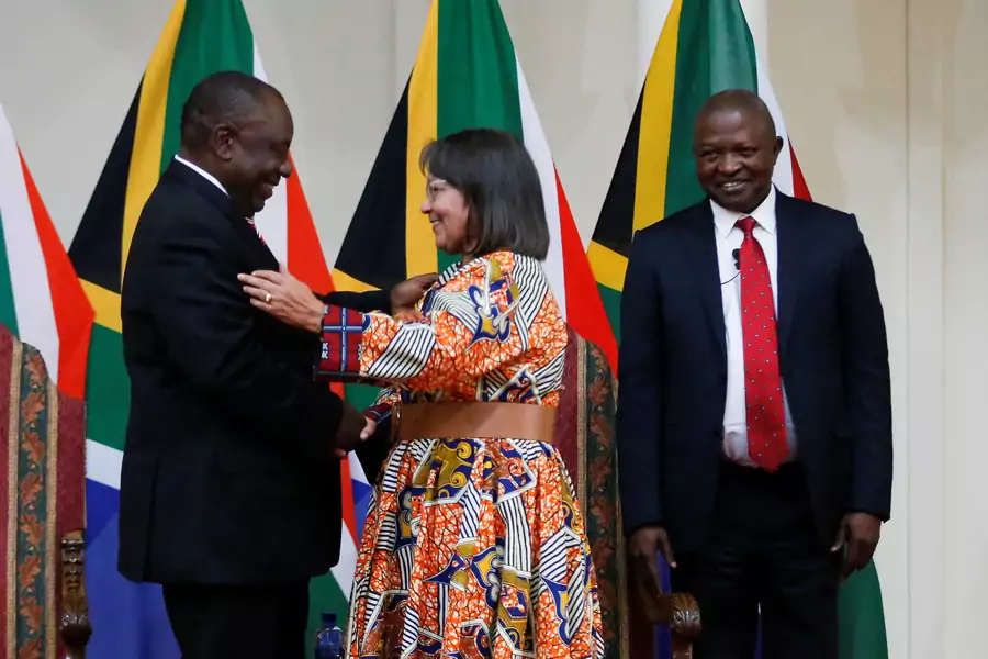 South Africa's Public Works and Infrastructure Minister Patricia de Lille is congratulated by President Cyril Ramaphosa after a swearing-in ceremony in Pretoria, South Africa, on May 30, 2019. 