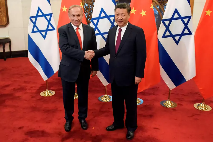 Chinese President Xi Jinping and Israeli Prime Minister Benjamin Netanyahu shake hands ahead of their talks at Diaoyutai State Guesthouse in Beijing, China March 21, 2017. 