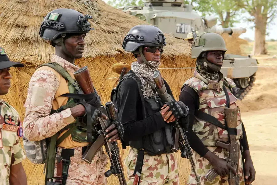 Nigerian Army soldiers stand at a base in Baga, Nigeria, on August 2, 2019. 
