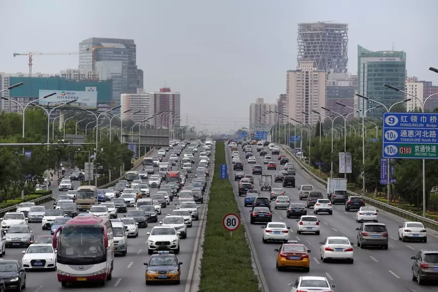 Cars drive on the road during the morning rush hour in Beijing, China, July 2, 2019. 