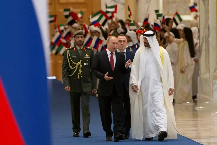 Russian President Vladimir Putin and Abu Dhabi Crown Prince Mohamed bin Zayed al-Nahyan attend a welcome ceremony in the United Arab Emirates, on October 15, 2019.