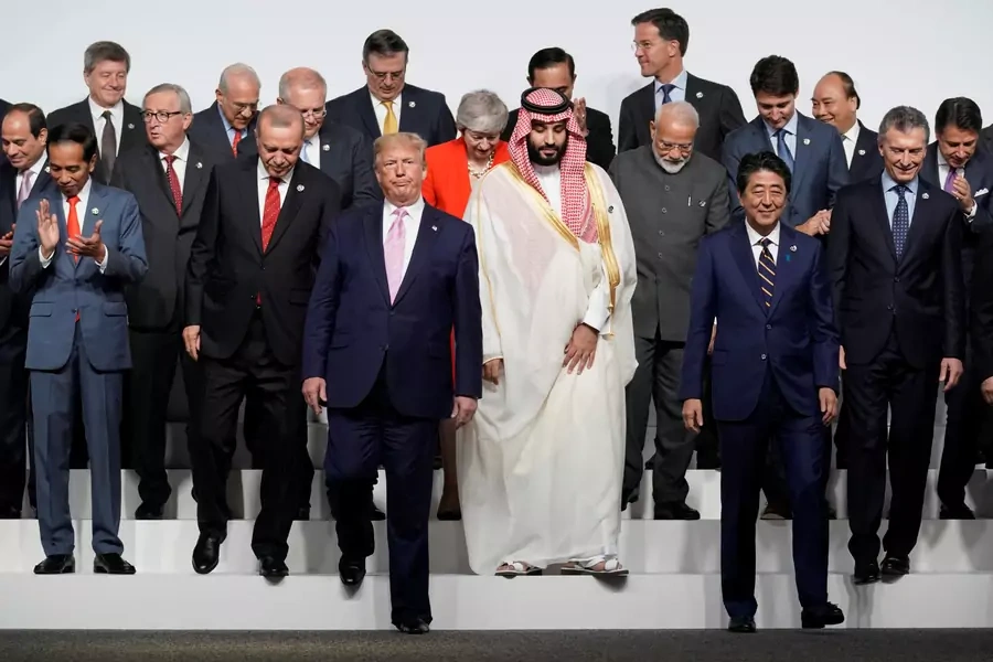 World leaders walk off after a family photo session at the G20 leaders summit in Osaka, Japan, on June 28, 2019.