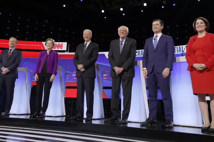 The top six Democratic presidential challengers take the stage at the January 14 debate in Des Moines, Iowa. 