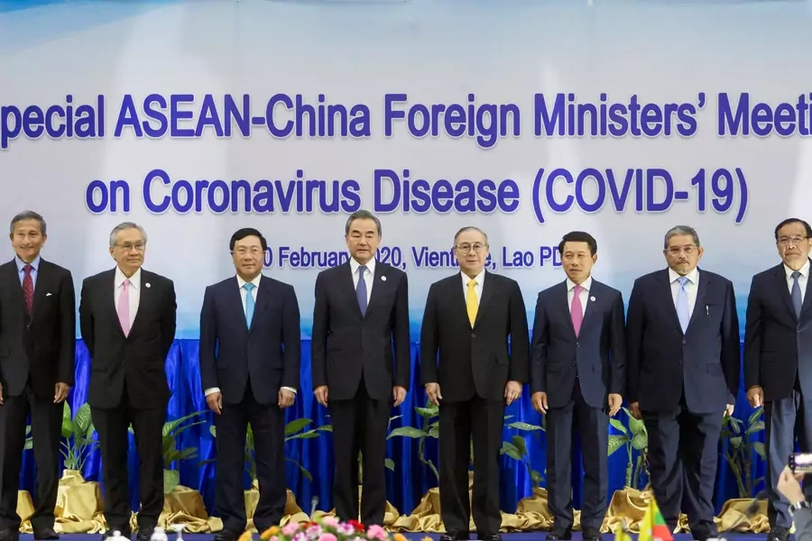 Association of Southeast Asian Nations (ASEAN) foreign ministers pose during an emergency meeting with China's Foreign Minister Wang Yi on the coronavirus outbreak in Vientiane, Laos on February 20, 2020.