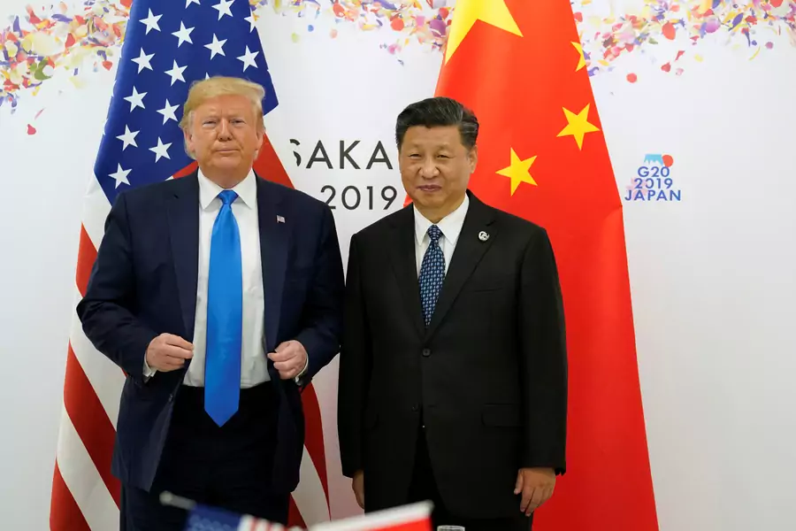 President Donald Trump and President Xi Jinping pose for a photo ahead of their bilateral meeting during the G20 leaders summit in Osaka, Japan.