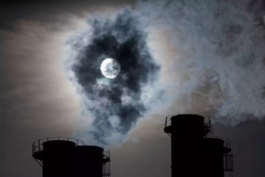 Sun shines through steam rising from chimneys of a power plant in Moscow, Russia on November 13, 2019. 
