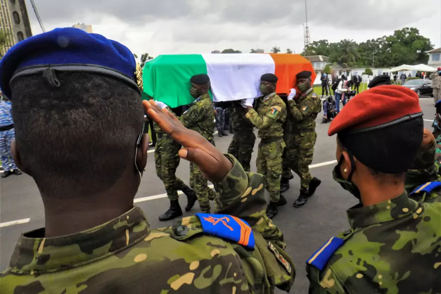 A dead soldier's coffin is carried during a national tribute ceremony dedicated to soldiers killed during a jihadi attack at Kafolo, in Abidjan, Ivory Coast, July 2, 2020.