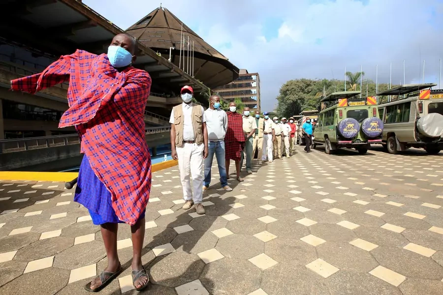 Kenyan tour guides and travel operators queue to receive the AstraZeneca/Oxford vaccine against the coronavirus disease (COVID-19), under the COVAX scheme, in Nairobi, Kenya, April 27, 2021