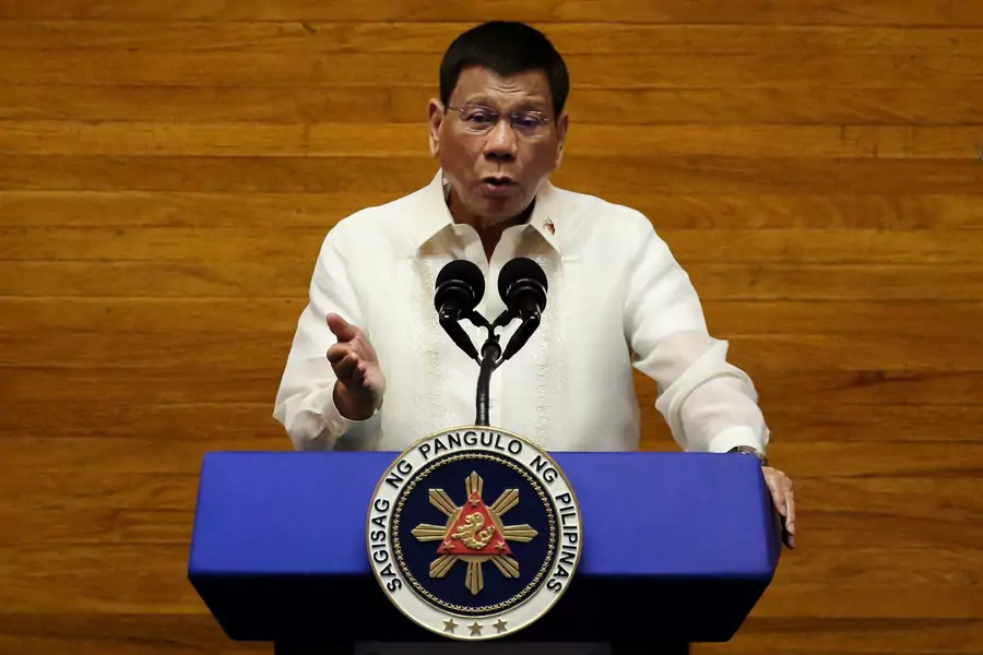 Philippine President Rodrigo Duterte gestures as he delivers his 6th State of the Nation Address (SONA), at the House of Representatives in Quezon City, Metro Manila, Philippines, on July 26, 2021.