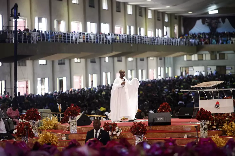 Bishop David Oyedepo, founder of the Living Faith Church, conducts a service for worshippers in the auditorium of the church in, Ogun state, Nigeria on September 28, 2014.