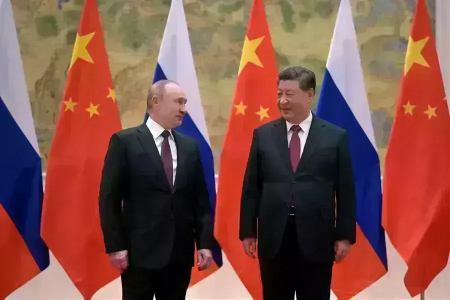 Russian President Vladimir Putin attends a meeting with Chinese President Xi Jinping in Beijing, China, on February 4, 2022.