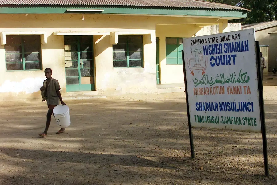 A sign outside the Higher Shariah Court in Gusauthe in the state of Zamfara, Nigeria, in November, 2002