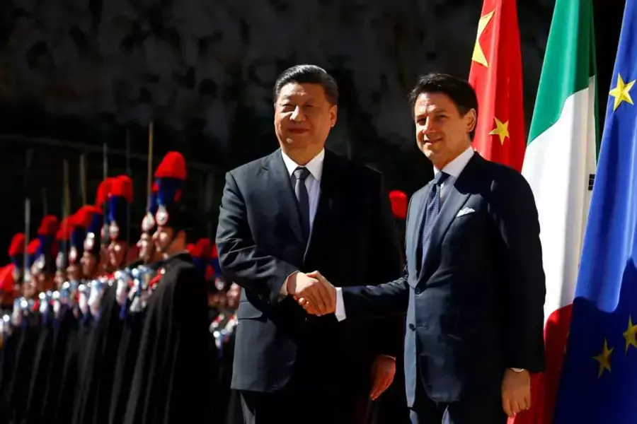 Former Italian Prime Minister Giuseppe Conte greets Chinese President Xi Jinping before a meeting in Rome, Italy in March, 2019.