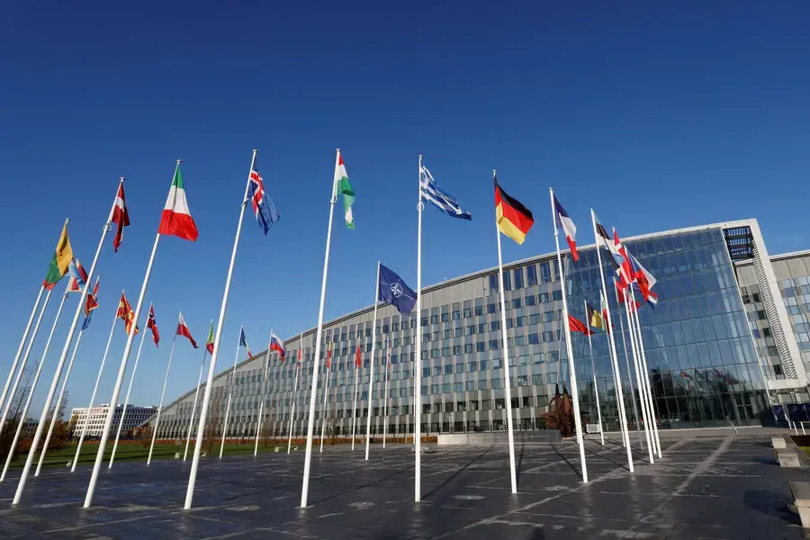 Flags fly outside NATO’s headquarters in Brussels, Belgium, on November 16, 2022.