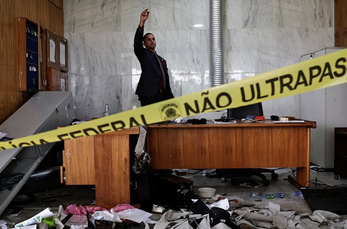 A person inspects the damage, after the supporters of Brazil's former President Jair Bolsonaro anti-democratic riot at Planalto Palace.
