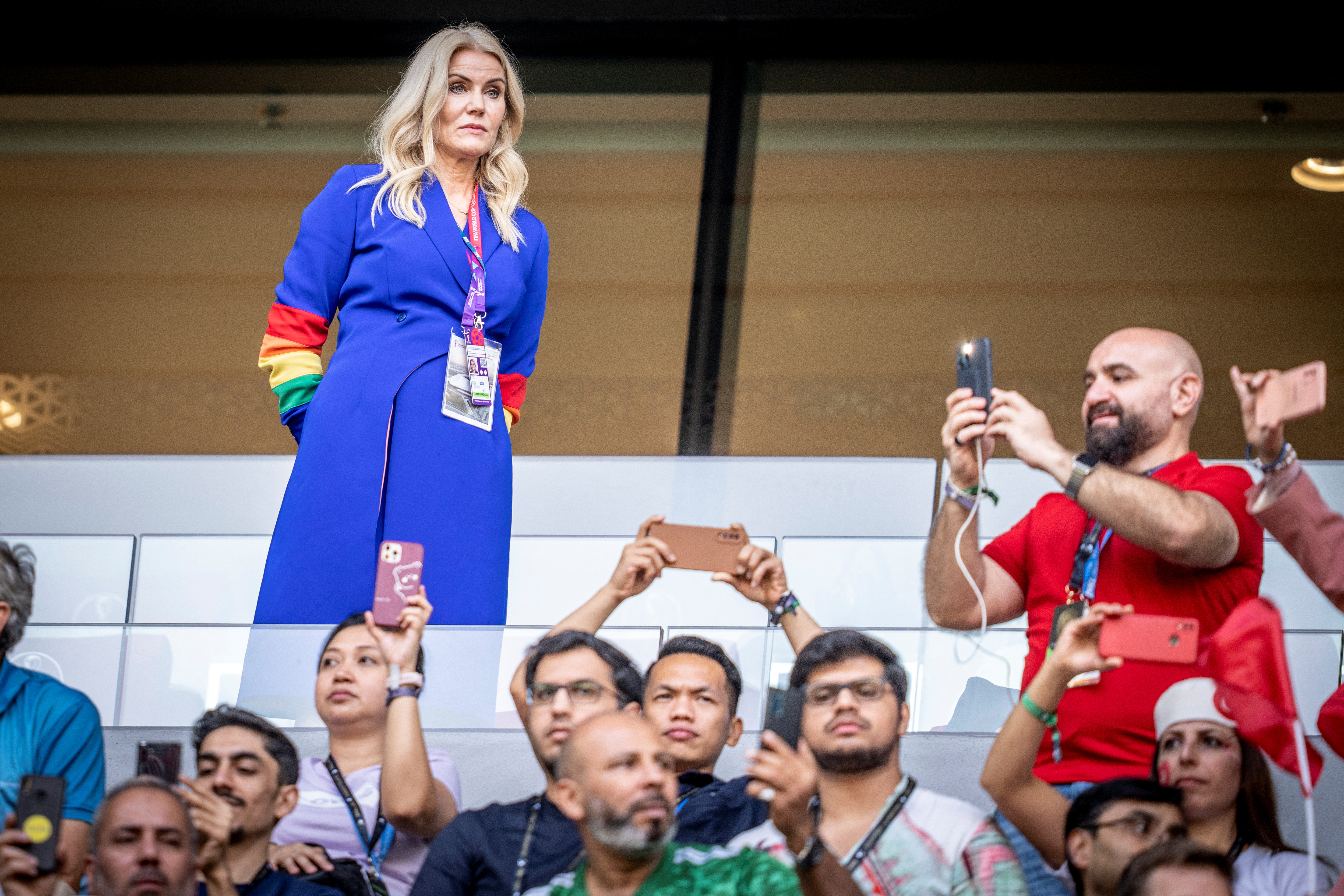 Former Danish Prime Minister Helle Thorning-Schmidt wears the rainbow-coloured armband during the FIFA World cup.