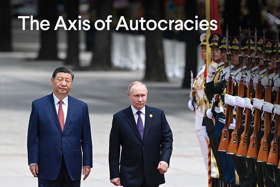 Putin and Xi Jinping walk in front of soldiers