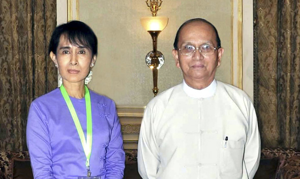 Mynamar’s Aung San Suu Kyi meets President Thein Sein at the presidential palace in Naypyitaw.