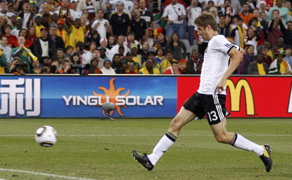 Germany’s Thomas Mueller shoots to score his team’s fourth goal against England during a 2010 World Cup second round soccer match at Free State stadium in Bloemfontein June 27, 2010.   