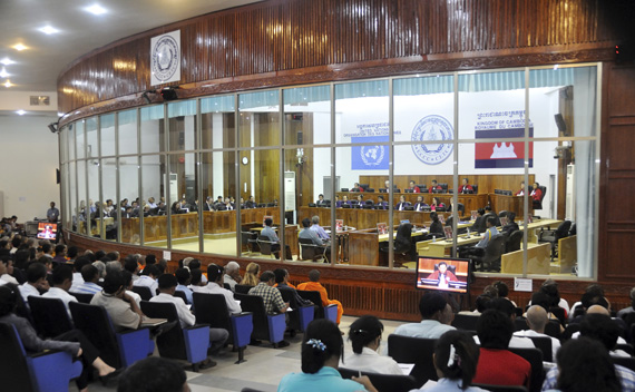 People watch the court proceedings in the sentencing session of former Khmer Rouge cadre Kaing Guek Eav, also known as Duch, at the ECCC