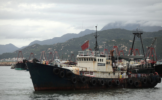 Activists on a fishing boat depart for the disputed Senkaku or Diaoyu islands from an island in Hong Kong