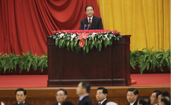 China’s Premier Wen Jiabao (top) delivers a speech on a stage as other Chinese top leaders are seen at a reception marking the 61st anniversary of China at the Great Hall of the People in Beijing September 30, 2010. China celebrates its National Day on October 1.