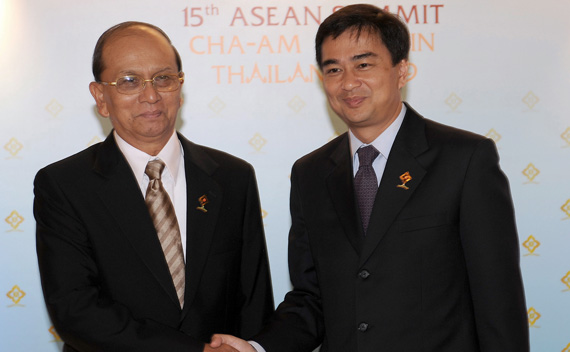 Thailand’s PM Abhisit shakes hand with Myanmar’s PM Thein during the 15th ASEAN Summit and related summits in Hua Hin