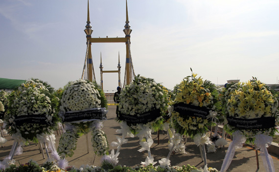 Wreaths of flowers are placed near the scene of a stampede in Phnom Penh