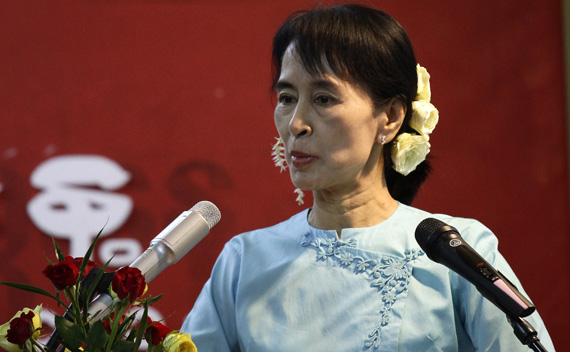 Myanmar’s pro-democracy leader Aung San Suu Kyi addresses crowd during a ceremony to mark 63rd Independence Day at NLD head office in Yangon