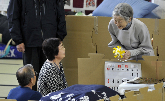 Japan’s Empress Michiko (top R) talks with evacuees as she visit an evacuation shelter in Sendai, Miyagi Prefecture, April 27, 2011. Japanese Emperor Akihito and Empress Michiko met and chatted with survivors of last month’s massive earthquake and tsunami on Wednesday, offering comfort and solace in a role that has helped keep the country’s ancient monarchy relevant in modern times.