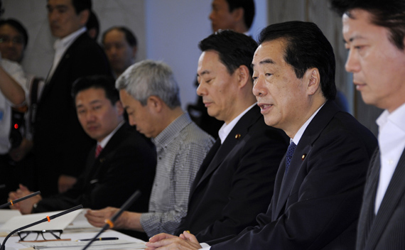 Japanese Prime Minister Naoto Kan (2nd R) attends a cabinet meeting on environment and energy in Tokyo June 22, 2011.