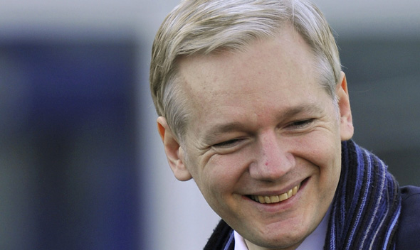 Founder of WikiLeaks Julian Assange smiles as he arrives for his extradition hearing at Belmarsh Magistrates’ Court in east London.