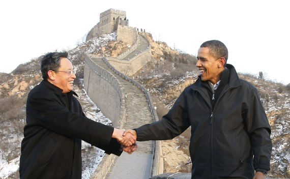 U.S. President Barack Obama (R) shakes hands with Chinese Ambassador to the United States Zhou Wenzhong during a tour of the Great Wall of China in Badaling November 18, 2009.