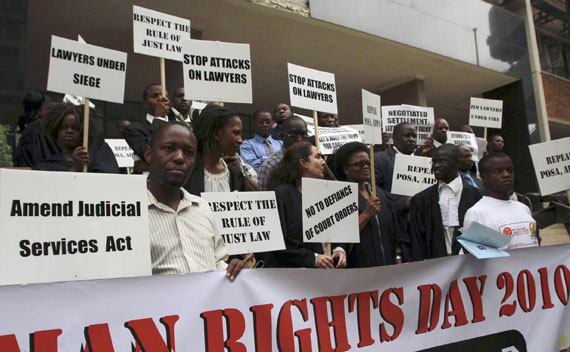 Lawyers hold a protest march to commemorate Human Rights Day in Harare, Zimbabwe, December 9, 2010.